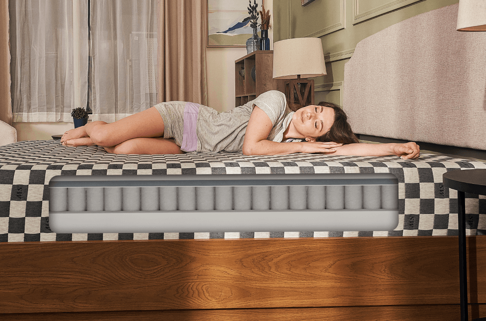 A women softly sleeping on sweetnight prime memory foam mattress