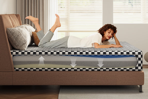 A woman lies on a checkered mattress with a cutaway view revealing its multi-layer foam construction for optimal support and breathability.