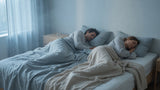 Couple sleeping cool and undisturbed on the best mattress for couples who sleep hot