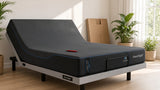 Modern bedroom with an adjustable bed base, head section raised, memory foam mattress and neutral bedding in soft morning light