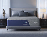 Gray bed with SweetNight mattress in a modern bedroom setting