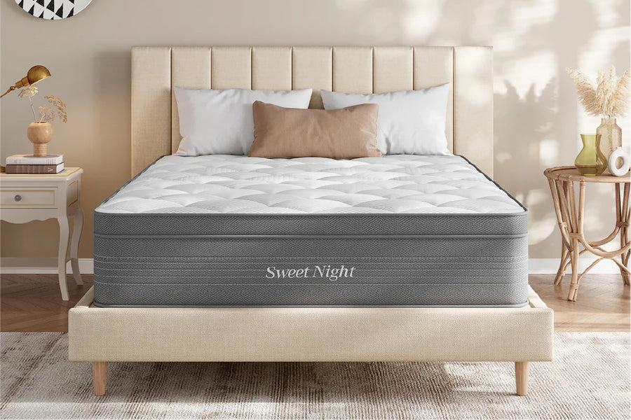 Sweet Night Gloaming Hybrid Mattress, white quilted top, gray sides, bedroom view.